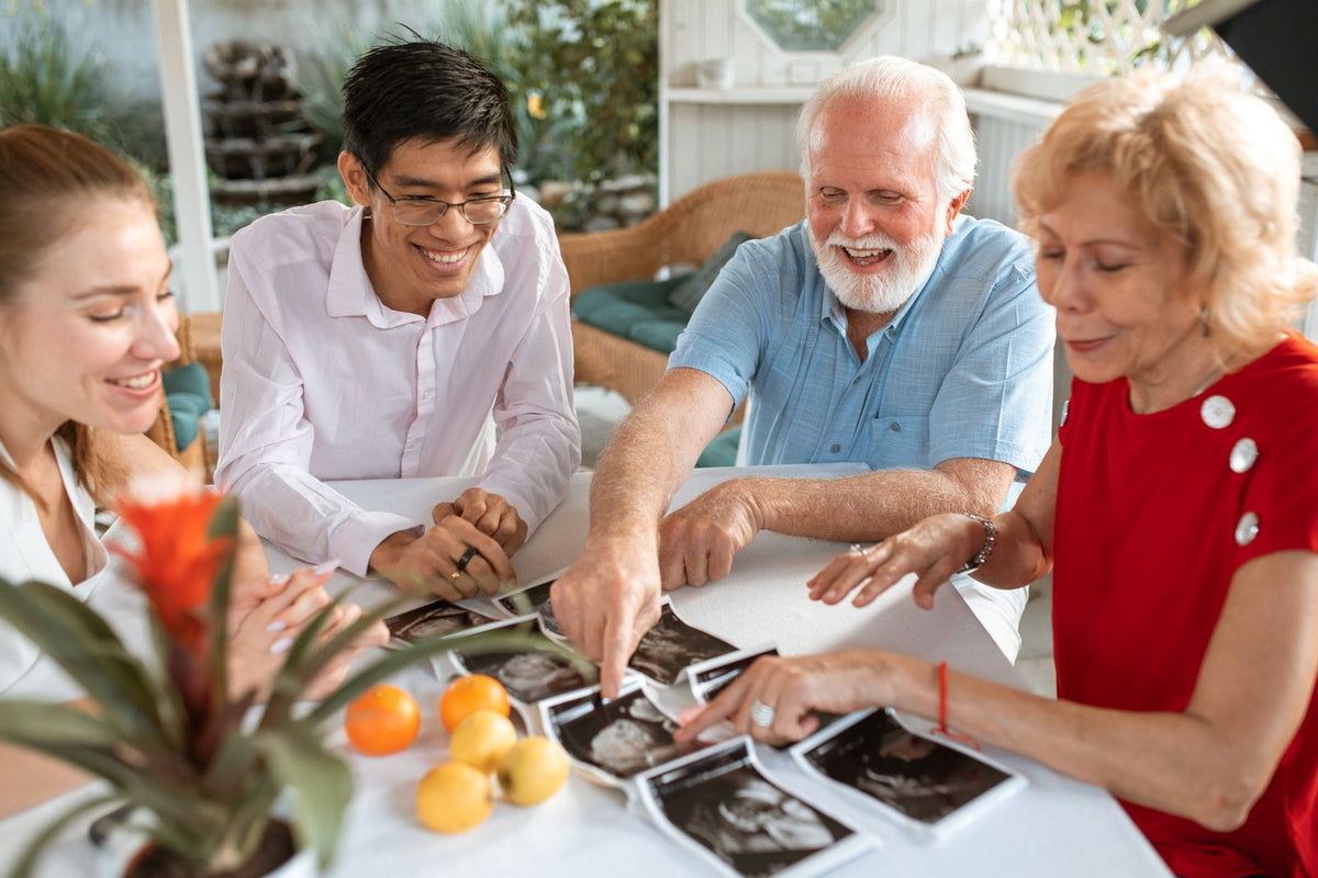 Multicultural family across generations sharing a conversation around the table